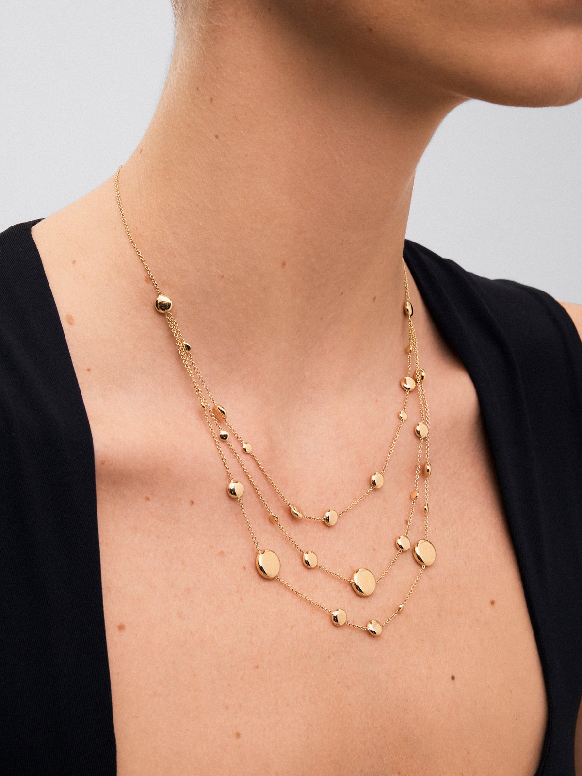 Collar triple de oro amarillo de 18K