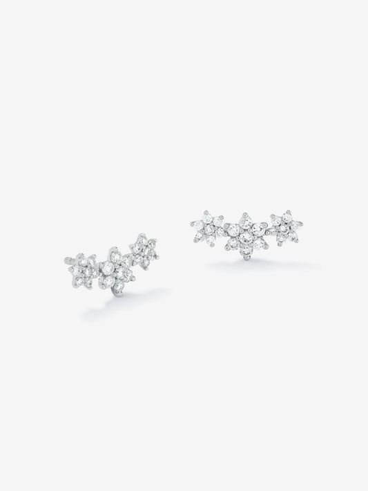 Pendientes trepadores de oro blanco de 18K con 42 diamantes en talla brillante con un total de 0,58 cts en forma de estrellas