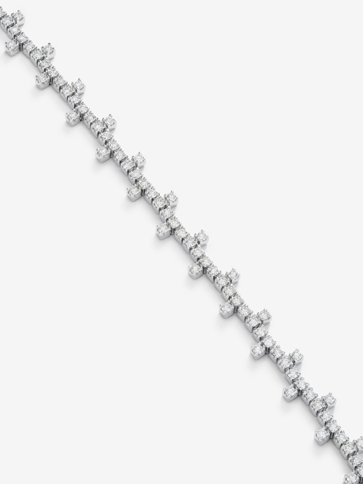 Pulsera semi rigida de oro blanco de 18K y diamante