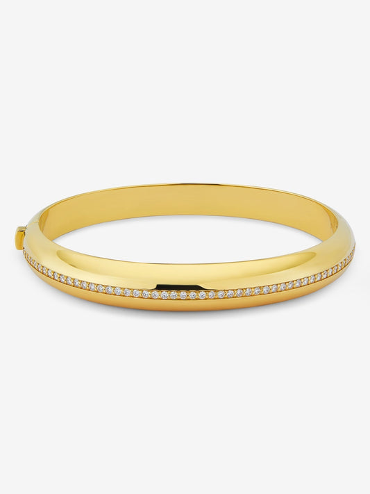 Pulsera rígida de oro amarillo de 18K con pavé de diamantes en talla brillante