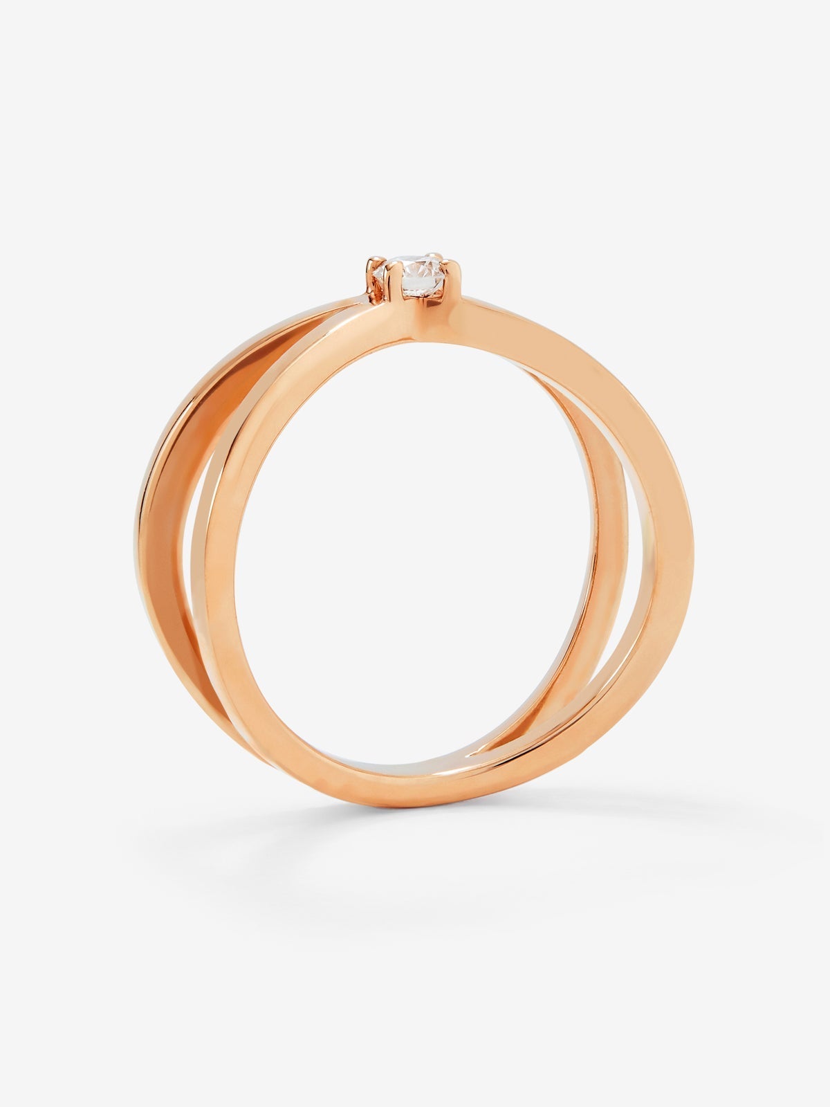 Anillo cruzado de oro rosa de 18K con diamante en talla brillante de 0,12 cts