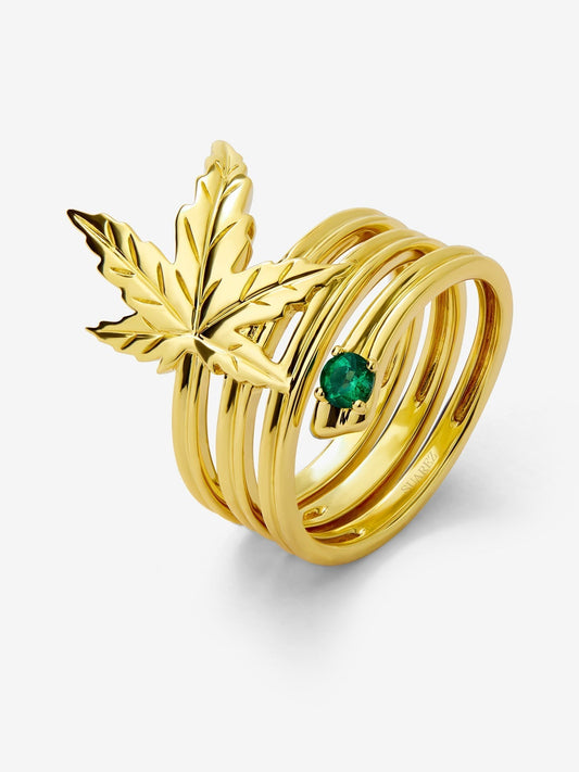 Anillo de oro amarillo de 18K con esmeralda en talla brillante de 0,11 cts y forma de hoja de arce