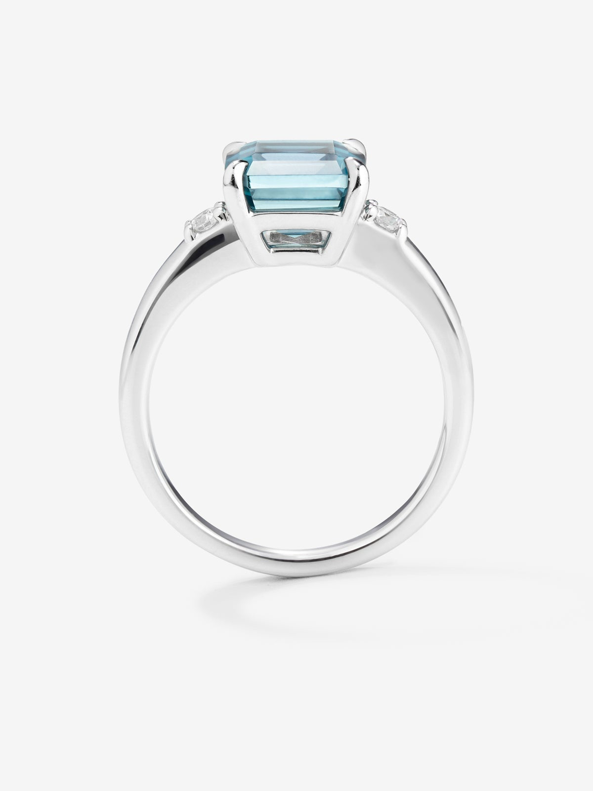 Anillo tresillo de plata con piedra topacio azul Sky central de 3,60cts y diamantes
