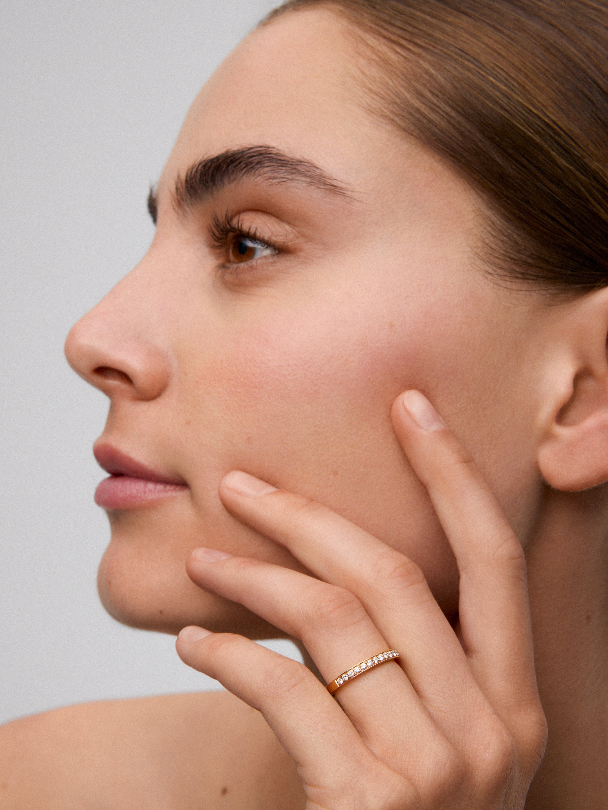 Half ring in 18K rose gold with 16 brilliant-cut diamonds with a total of 0.25 cts