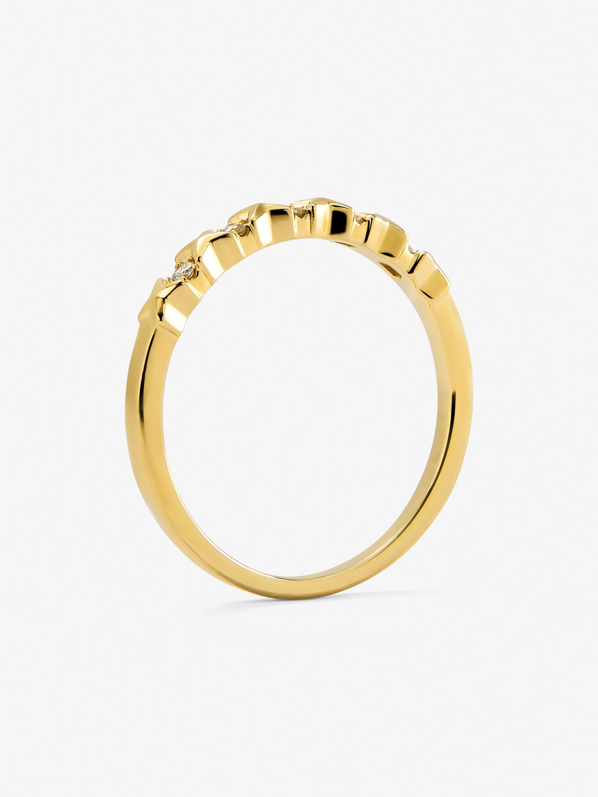 Anillo de oro amarillo de 18K con 5 diamantes en talla brillante con un total de 0,07 cts