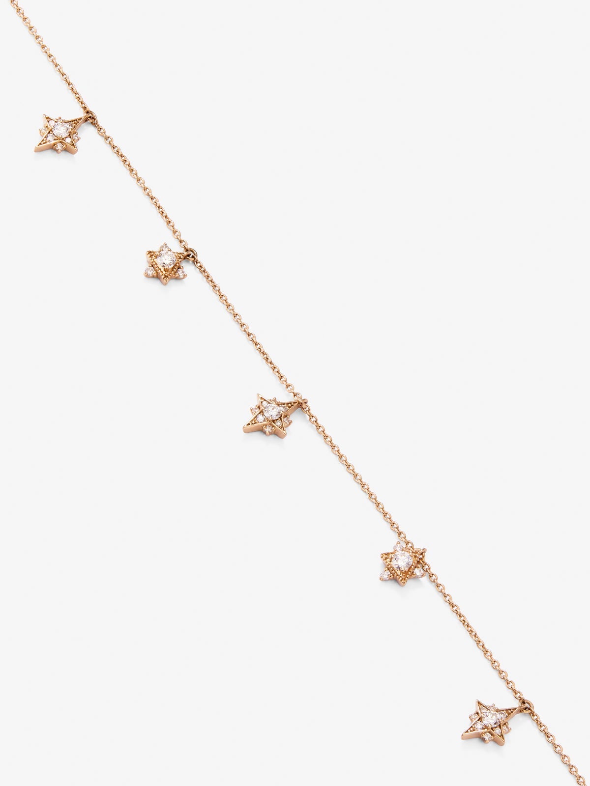 Collar gargantilla con estrellas de oro rosa de 18K con diamantes