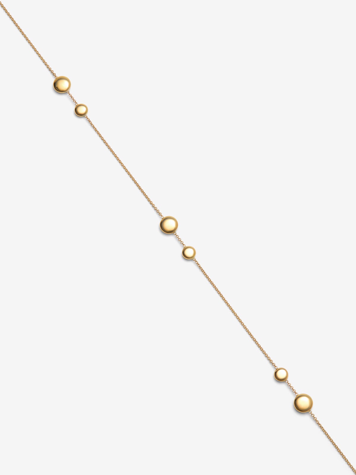 Collar de oro amarillo de 18K con 6 diamantes en talla brillante con un total de 0,21 cts y motivos de esferas