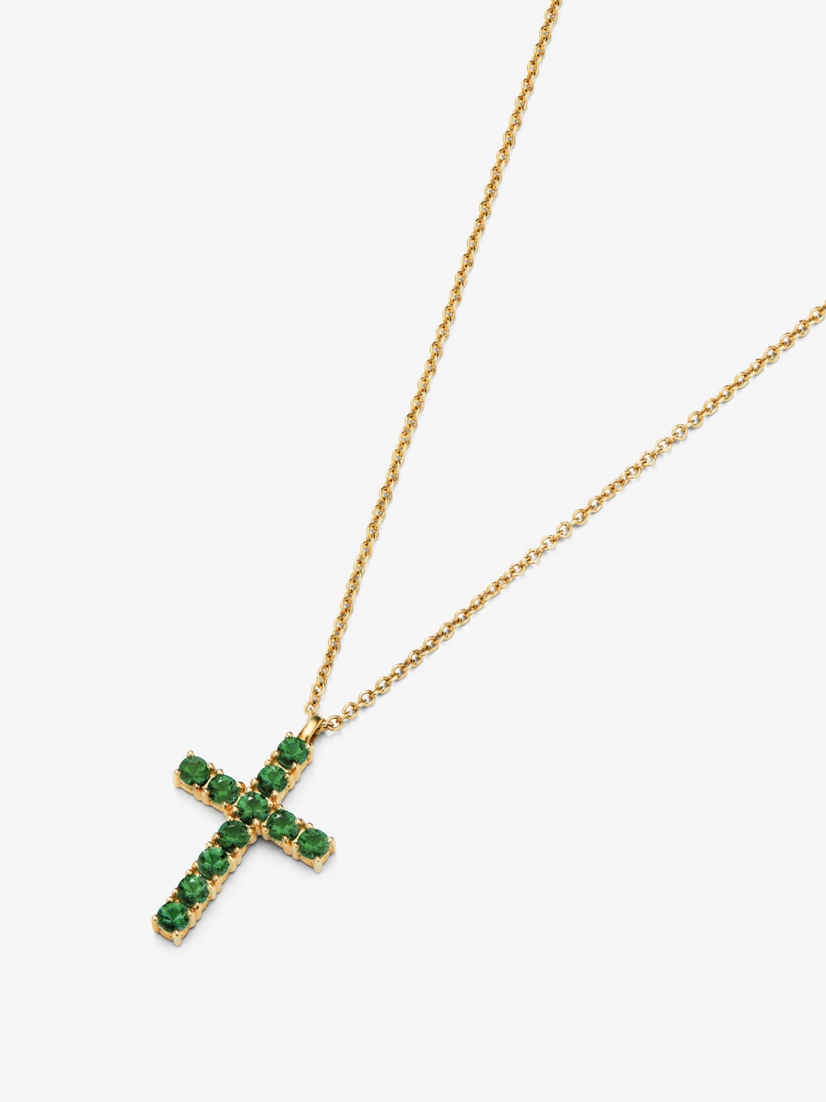 Colgante de oro amarillo de 18K con cruz de 11 esmeraldas en talla brillante con un total de 0,35 cts
