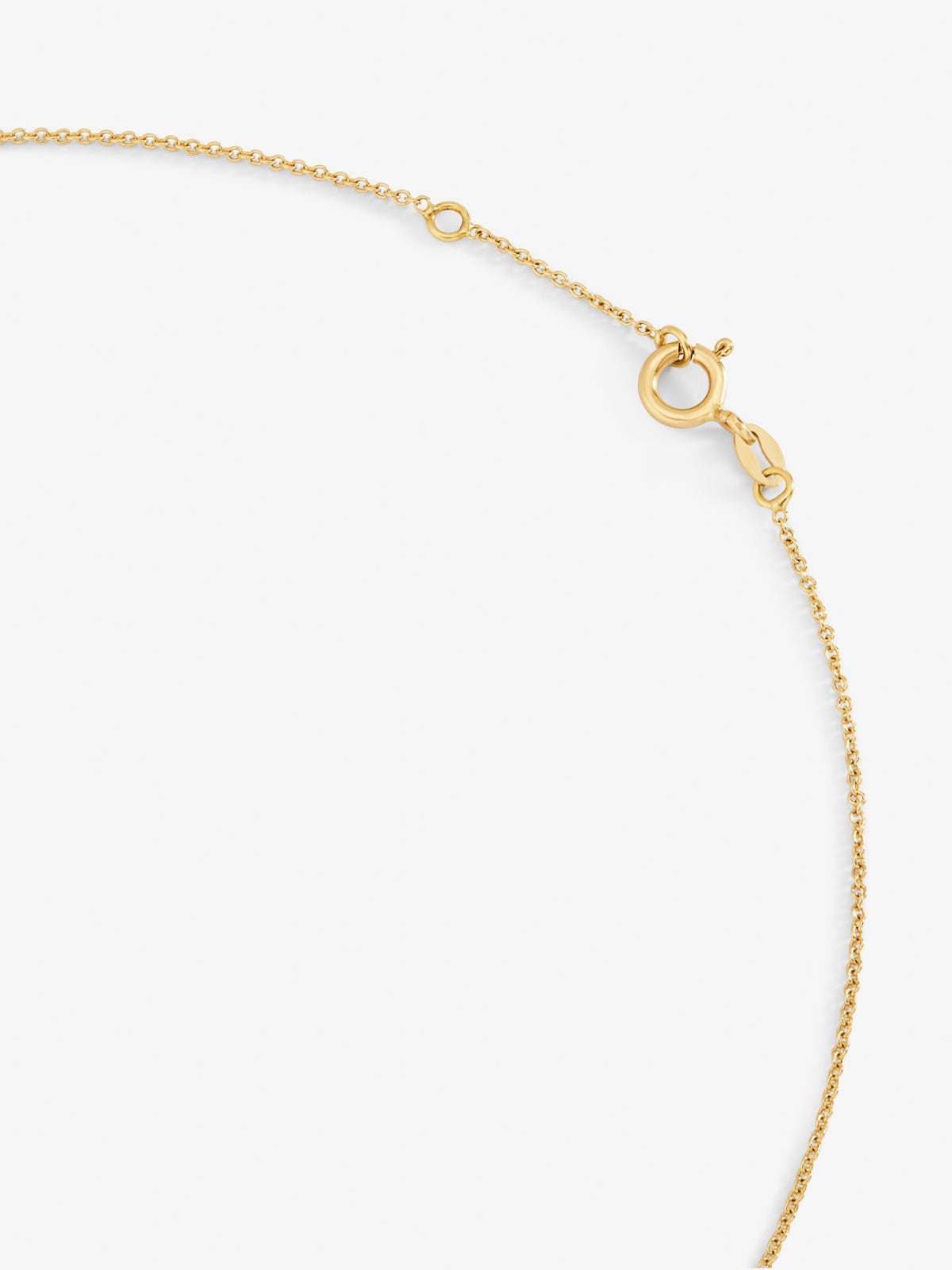 Colgante de oro amarillo de 18K con cruz de 11 esmeraldas en talla brillante con un total de 0,35 cts