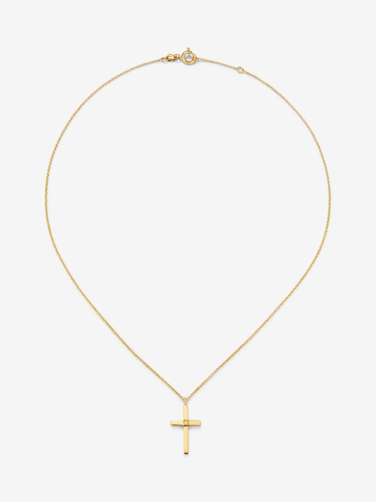 Colgante de oro amarillo de 18K con cruz grande y diamante en talla brillante de 0,015 cts