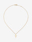 Colgante de oro amarillo de 18K con cruz mediana y diamante en talla brillante de 0,01 cts