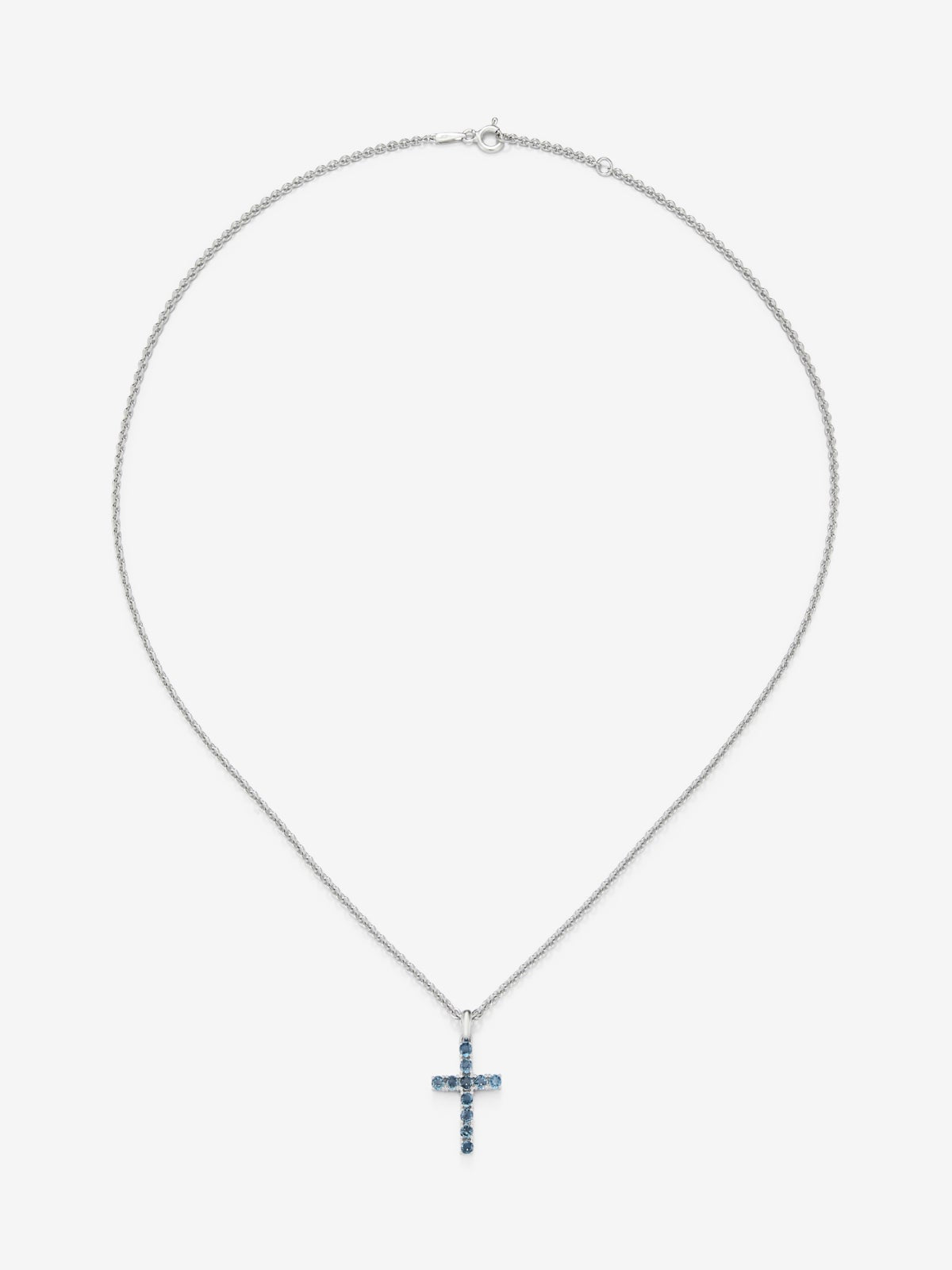 Colgante de cruz de plata 925 con 11 topacios azul london en talla brillante con un total de 0,49 cts