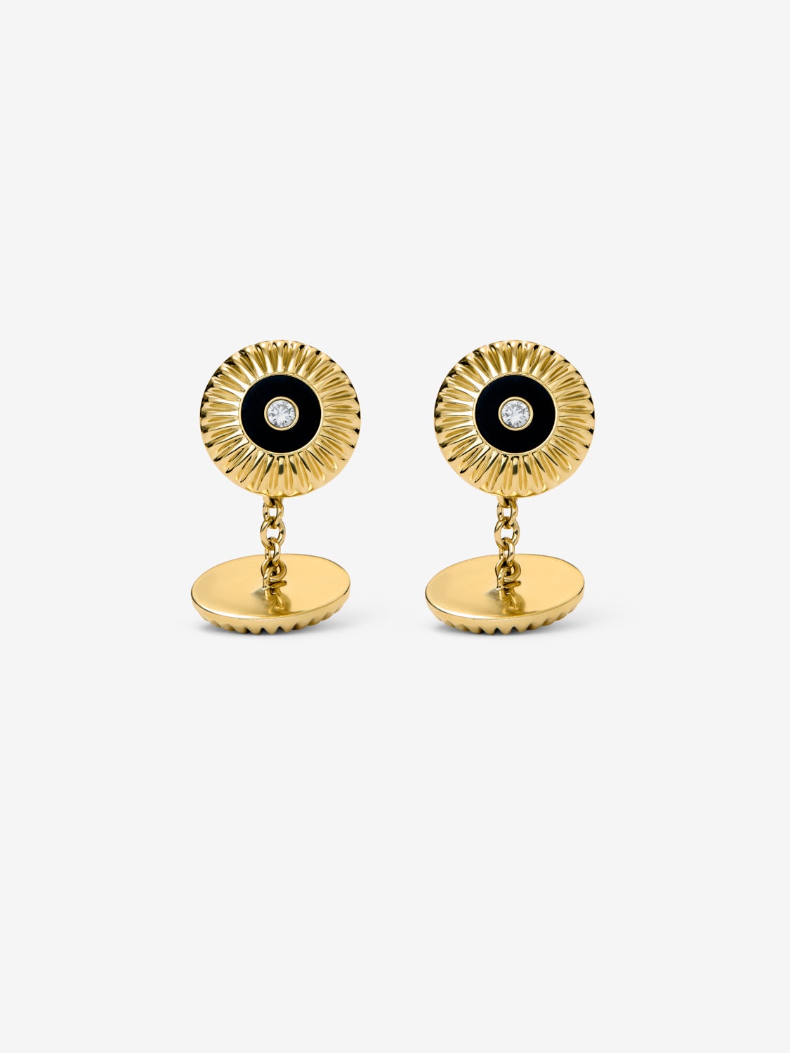 Gemelos de oro blanco de 18K con ónix negro en talla octogonal y diamantes en talla brillante con un total de 0,22 cts