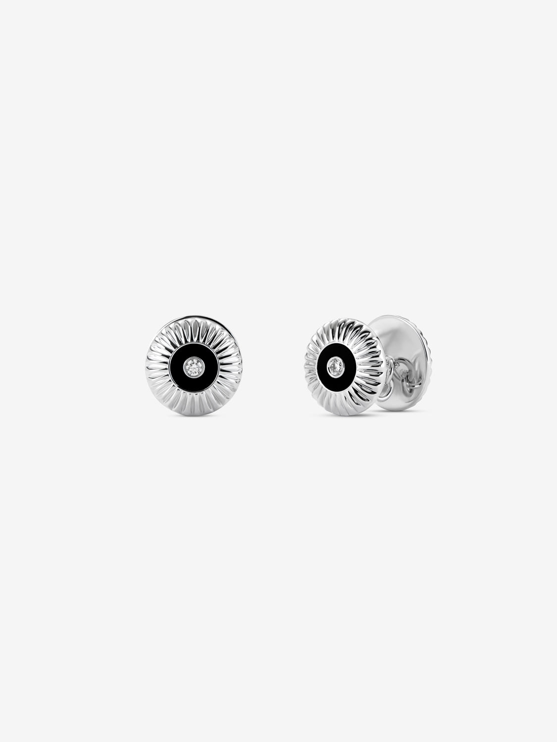 Gemelos de oro amarillo de 18K con ónix negro en talla octogonal y diamantes en talla brillante con un total de 0,22 cts