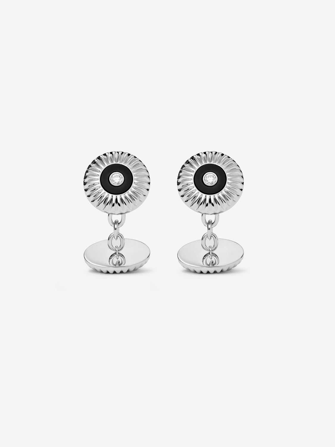 Gemelos de oro amarillo de 18K con ónix negro en talla octogonal y diamantes en talla brillante con un total de 0,22 cts