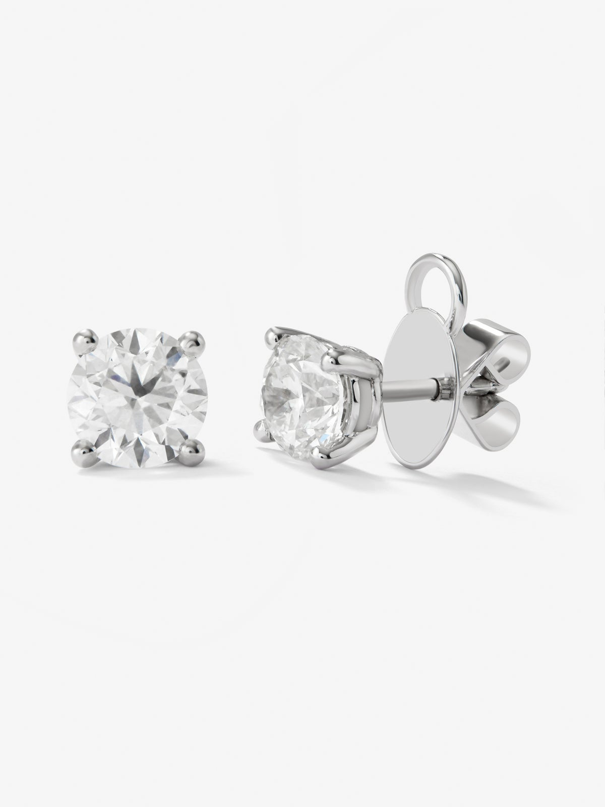 Pendientes solitarios de oro blanco de 18K con 2 diamantes en talla brillante con un total de 1 cts