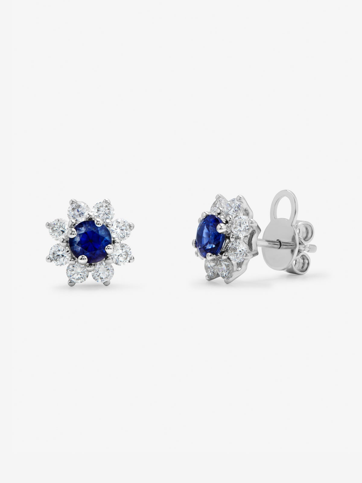 Pendientes con forma de estrella de oro blanco de 18K con 2 zafiros azules en talla brillante y diamantes blancos en talla brillante