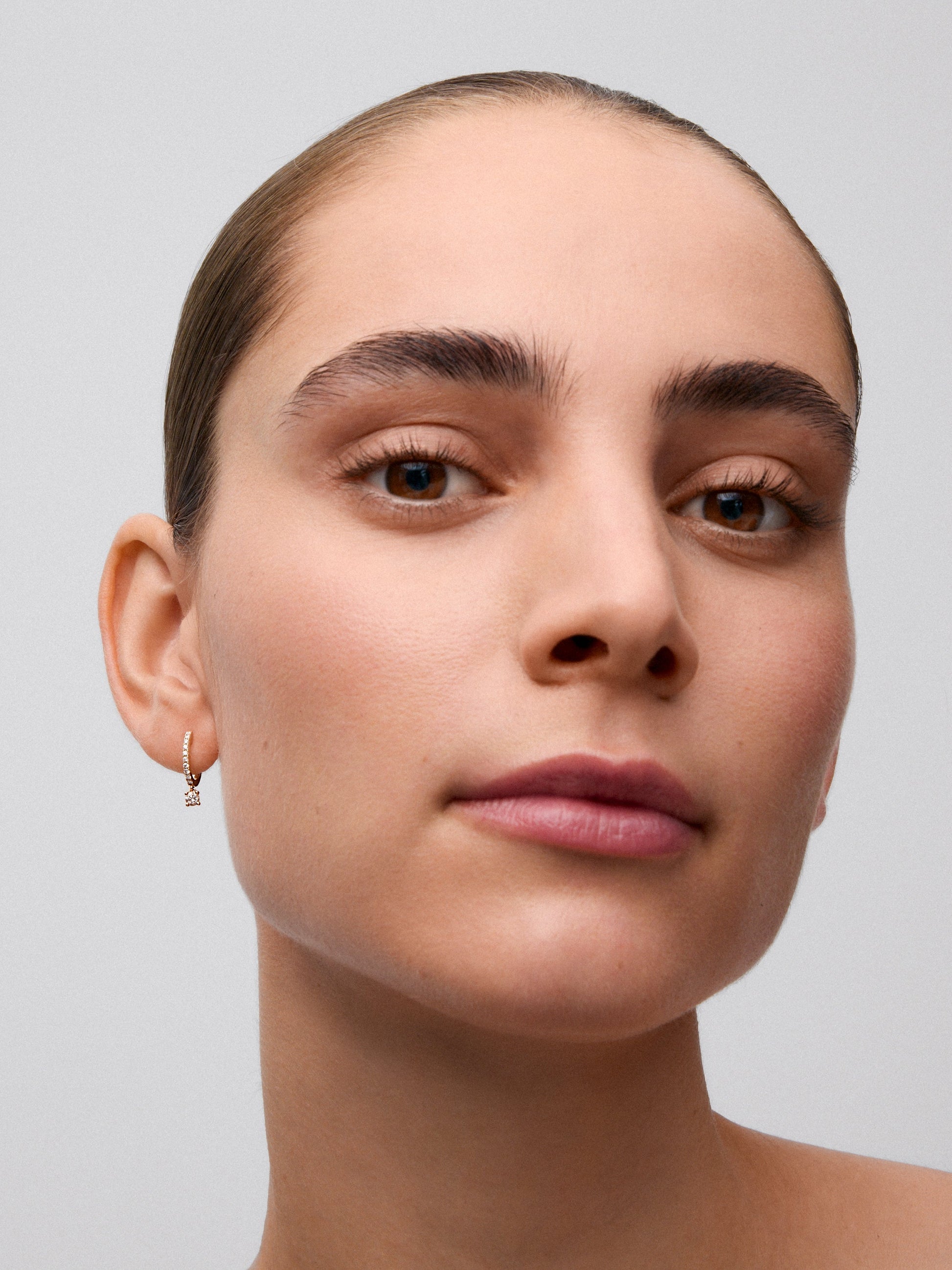 Pendientes de oro rosa de 18K con 20 diamantes en talla brillante con un total de 0,38 cts