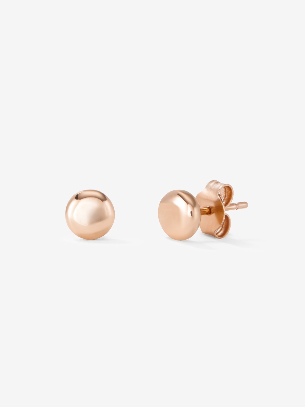Pendientes botón pequeño de oro rosa de 18K