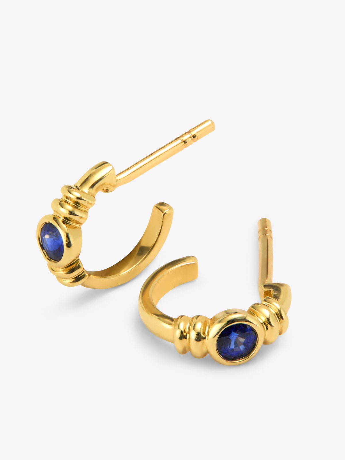 Pendientes de aro en oro amarillo de 18K con zafiro en talla brillante