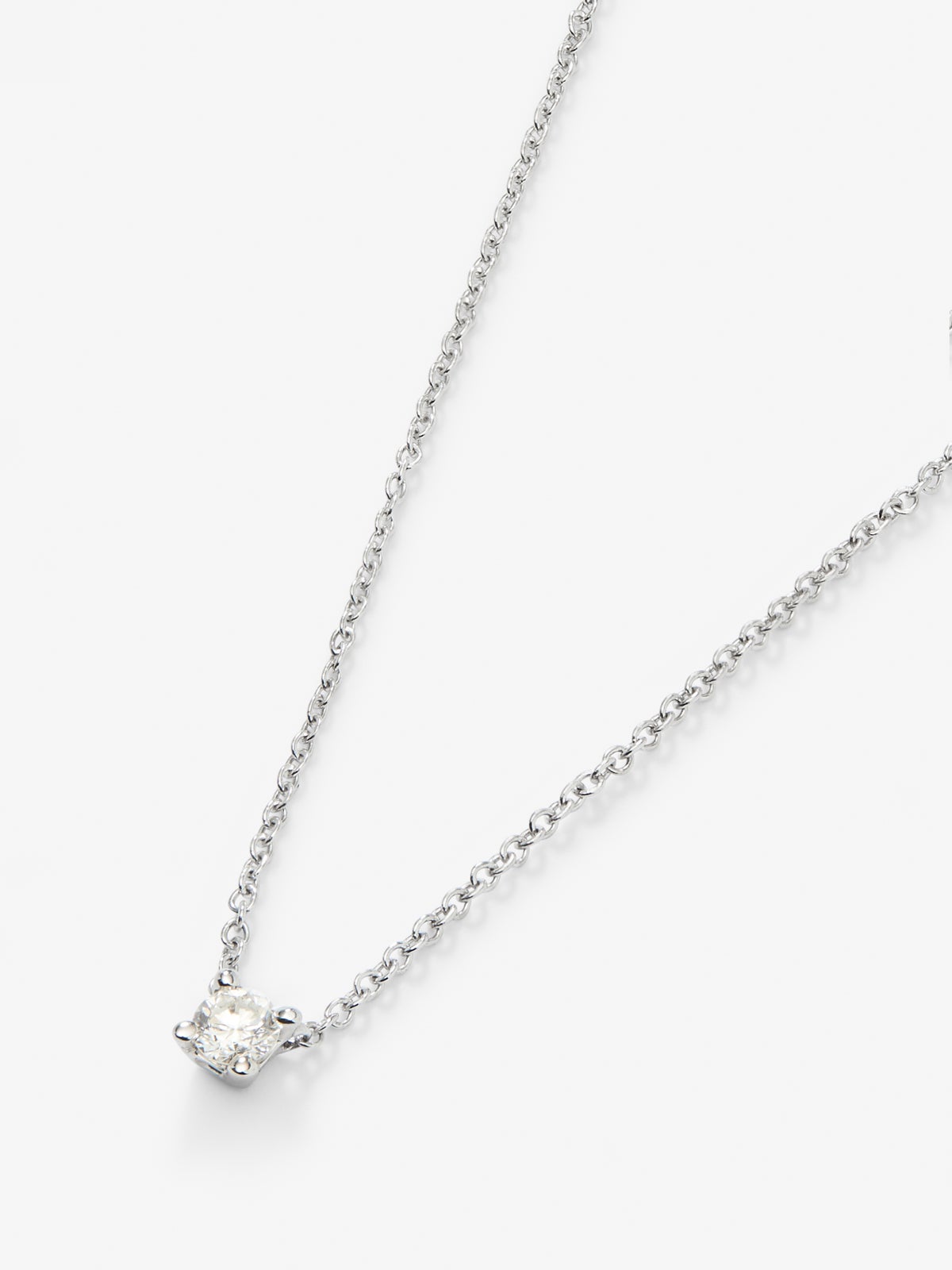 Colgante cadena de oro blanco de 18K con diamante solitario