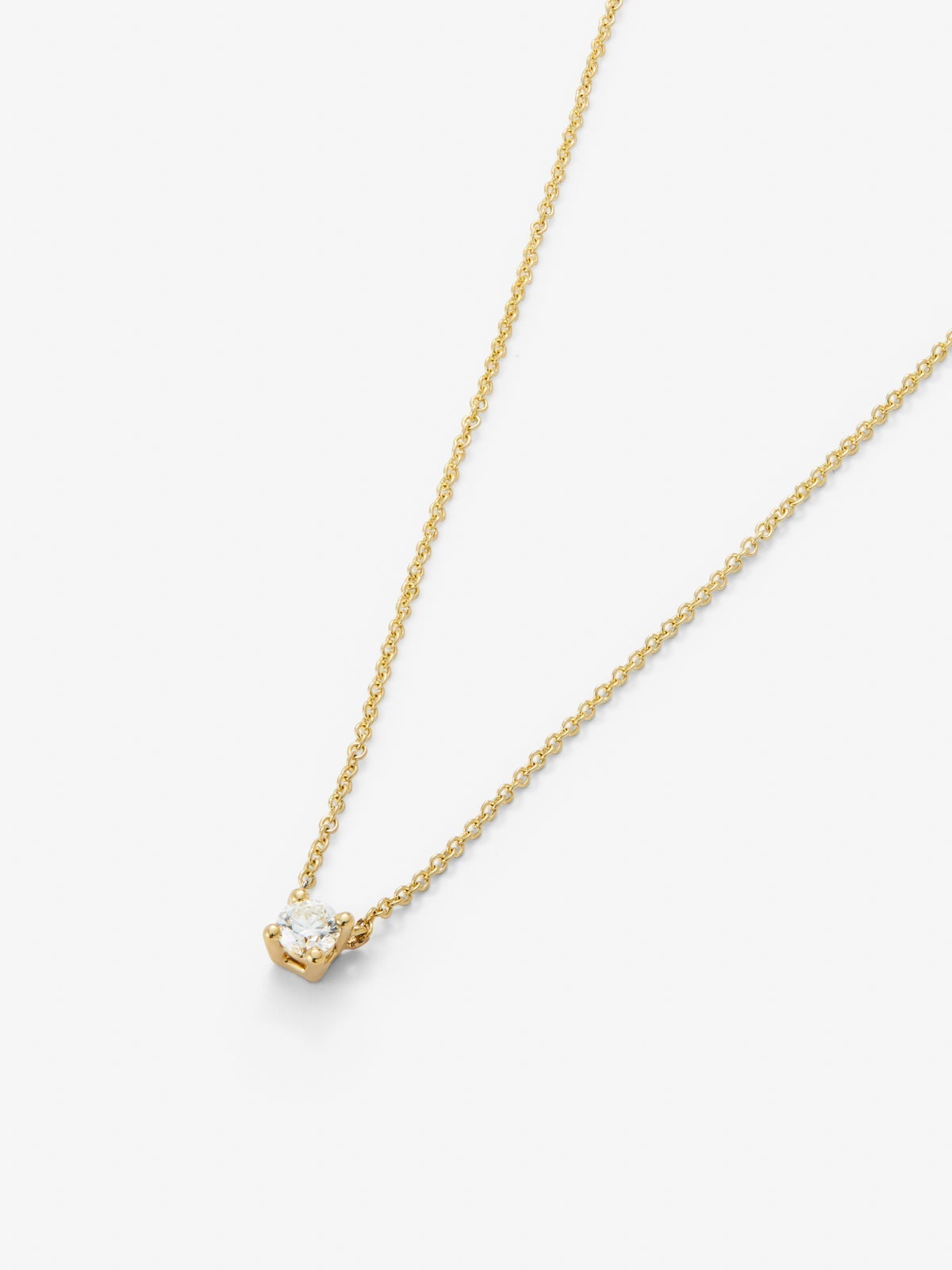 Colgante solitario de oro amarillo de 18K con diamante blanco en talla brillante de 0,1 cts