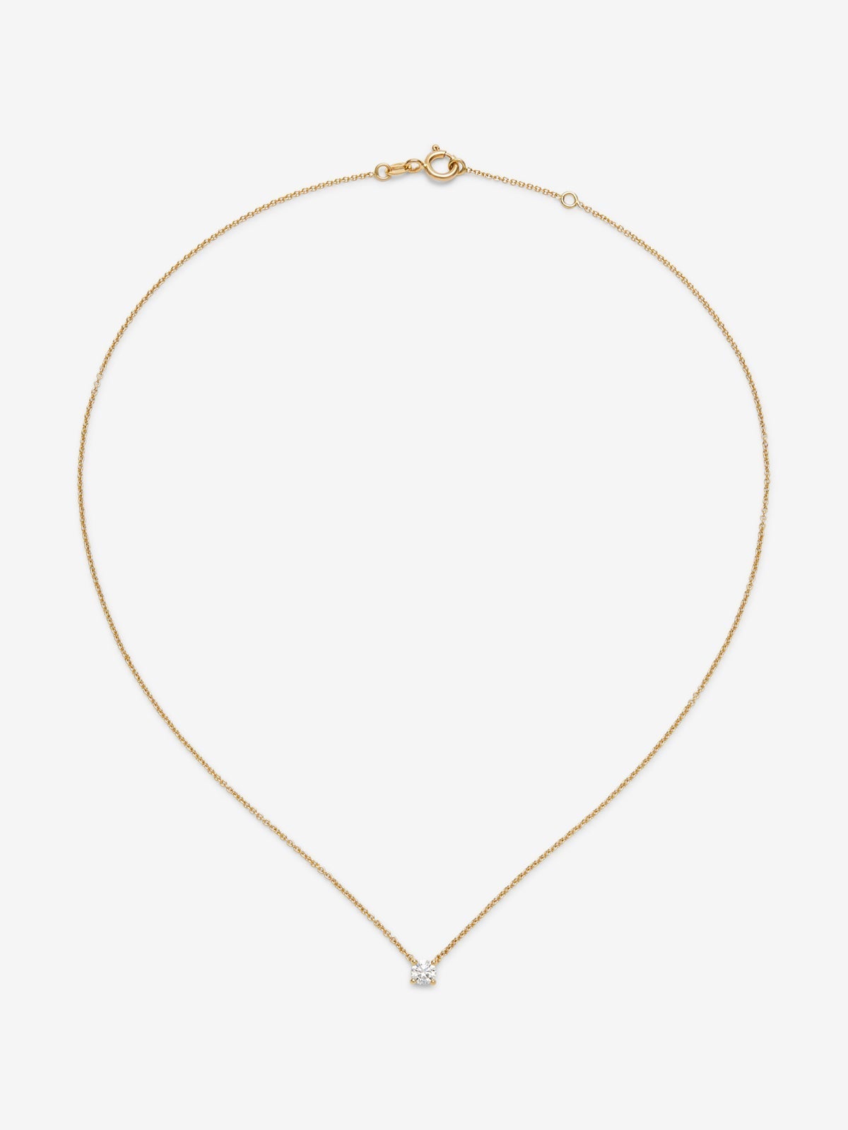 Collar de oro amarillo de 18K con diamante central en talla brillante de 0,30 cts