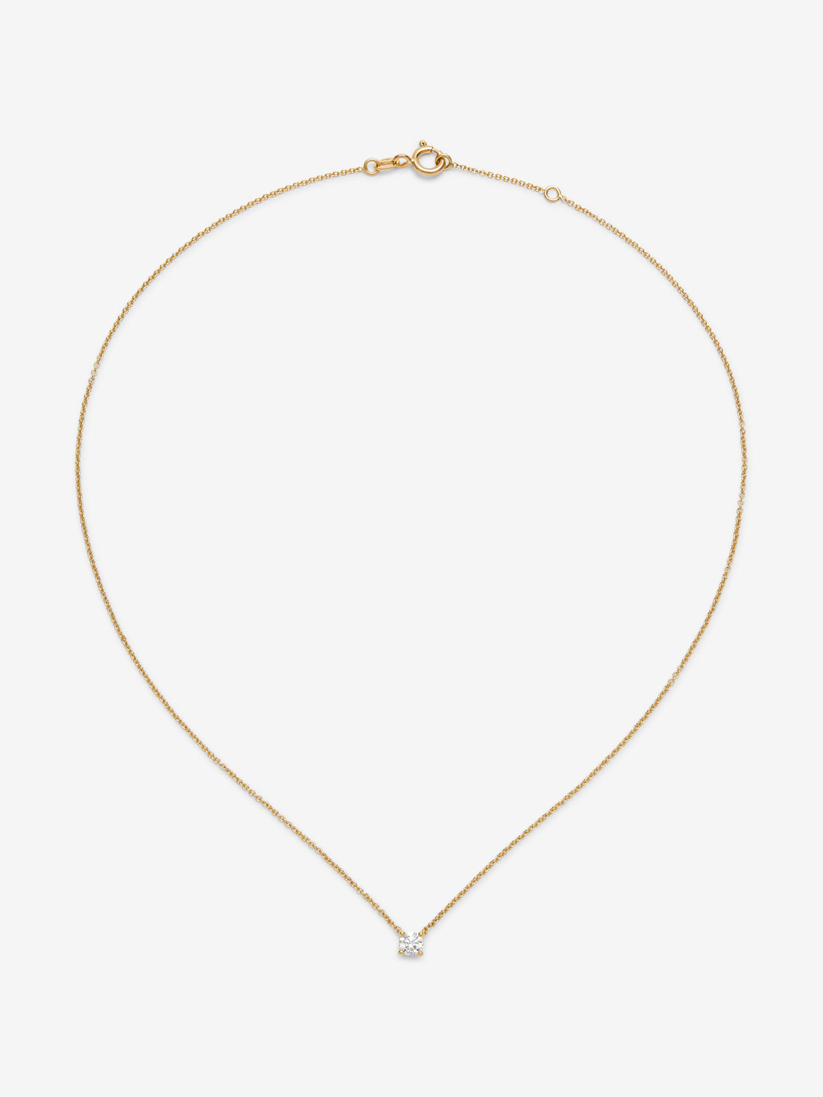 Collar de oro amarillo de 18K con diamante central en talla brillante de 0,30 cts