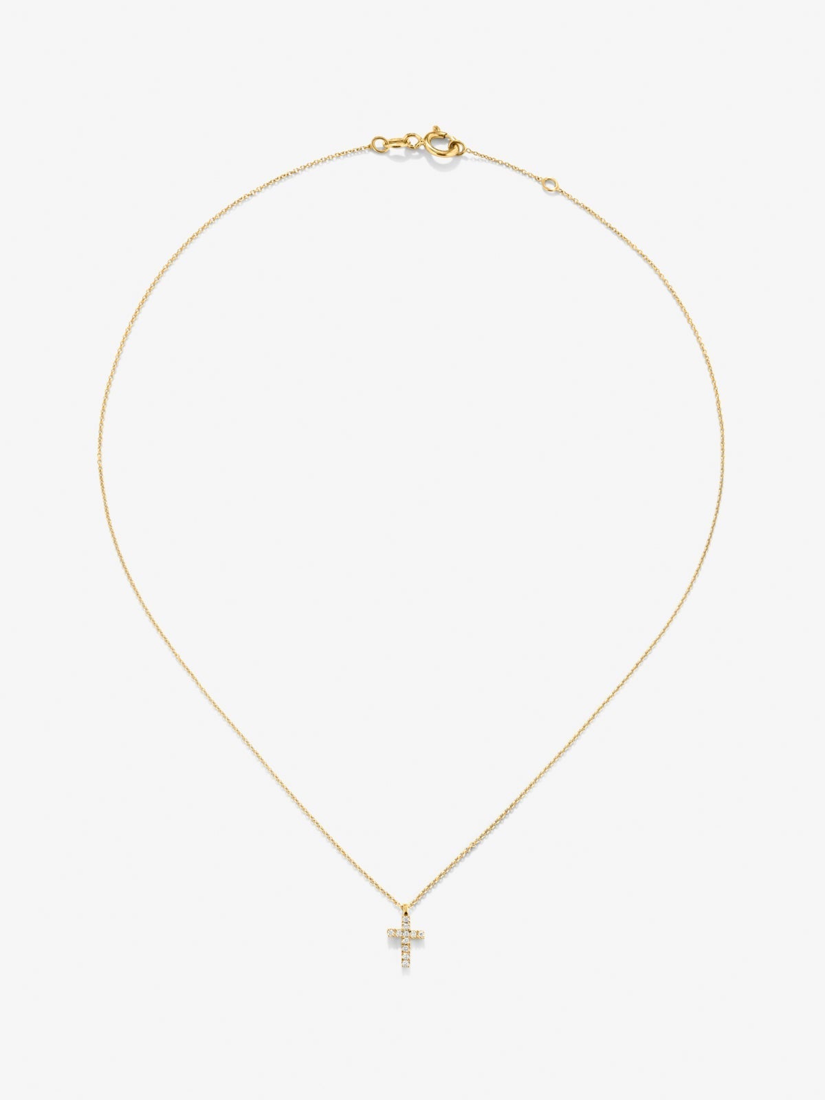 Colgante cadena cruz en oro amarillo de 18K con diamantes