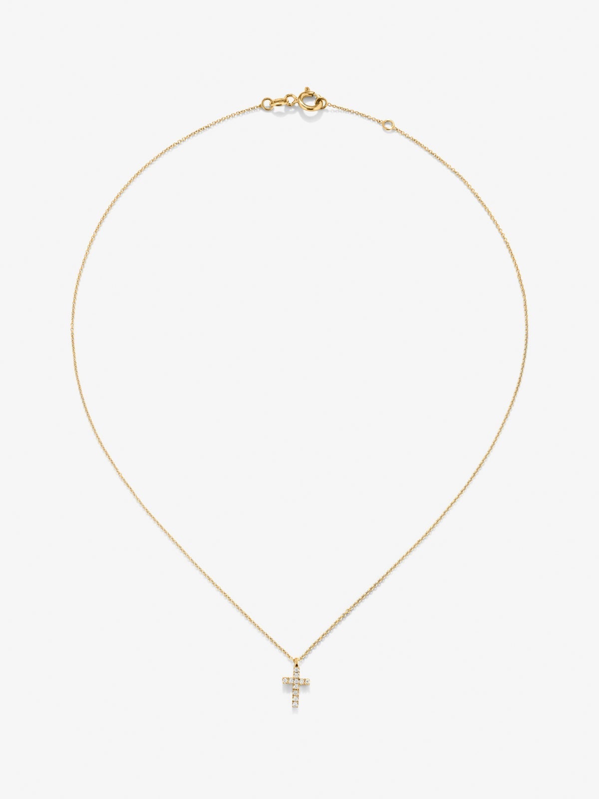 Colgante cadena cruz en oro amarillo de 18K con diamantes