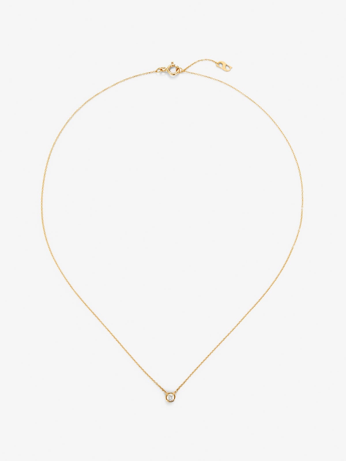 Colgante solitario de oro amarillo de 18K con diamante blanco en talla brillante de 0,1 cts