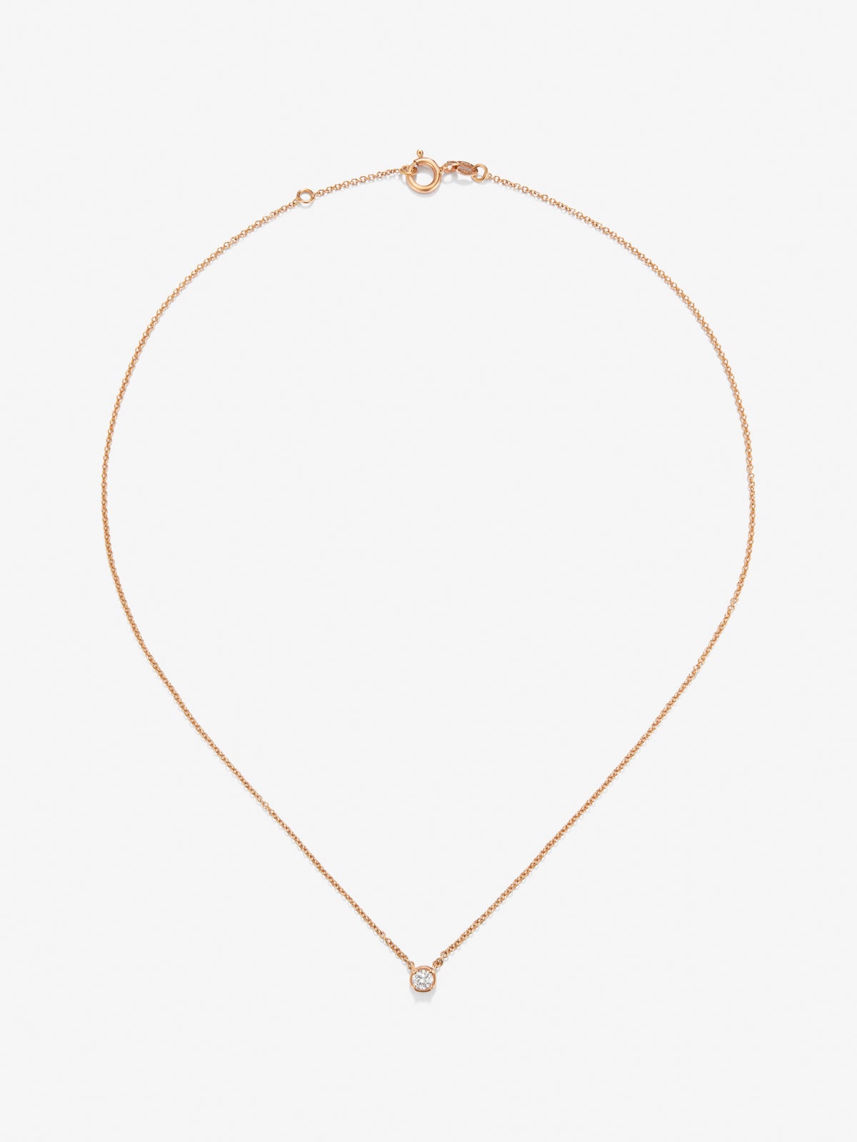 Colgante de oro rosa de 18K con diamantes en talla brillante de 0,1 cts