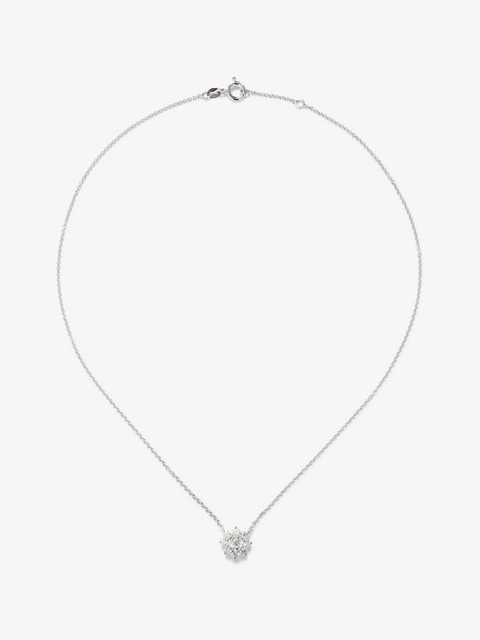 Colgante de oro blanco de 18K con diamante en talla brillante de 0,40 cts y forma de flor