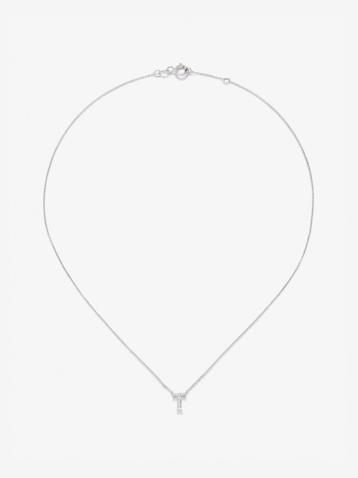 Colgante de oro blanco de 18K con letra T en pavé de 10 diamantes en talla brillante con un total de 0,0205 cts