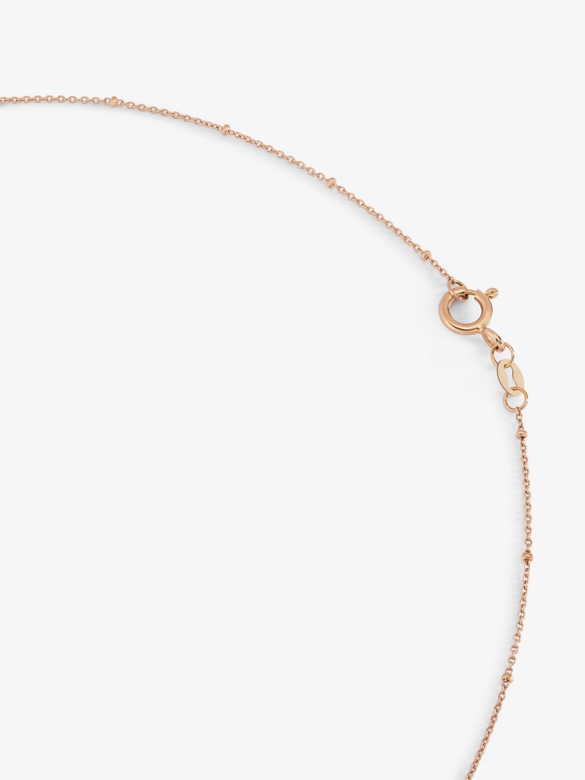 Colgante cadena con estrella de oro rosa de 18K con diamante