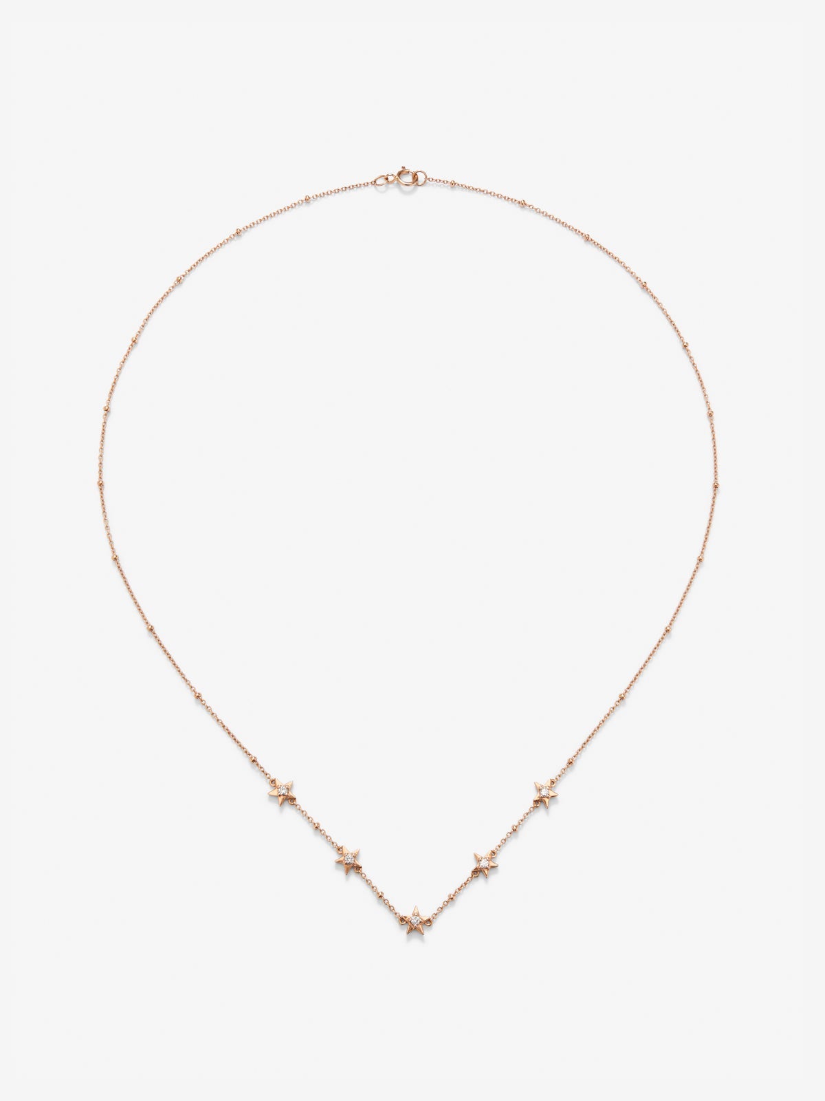 Colgante con estrellas de oro rosa de 18kt con diamantes