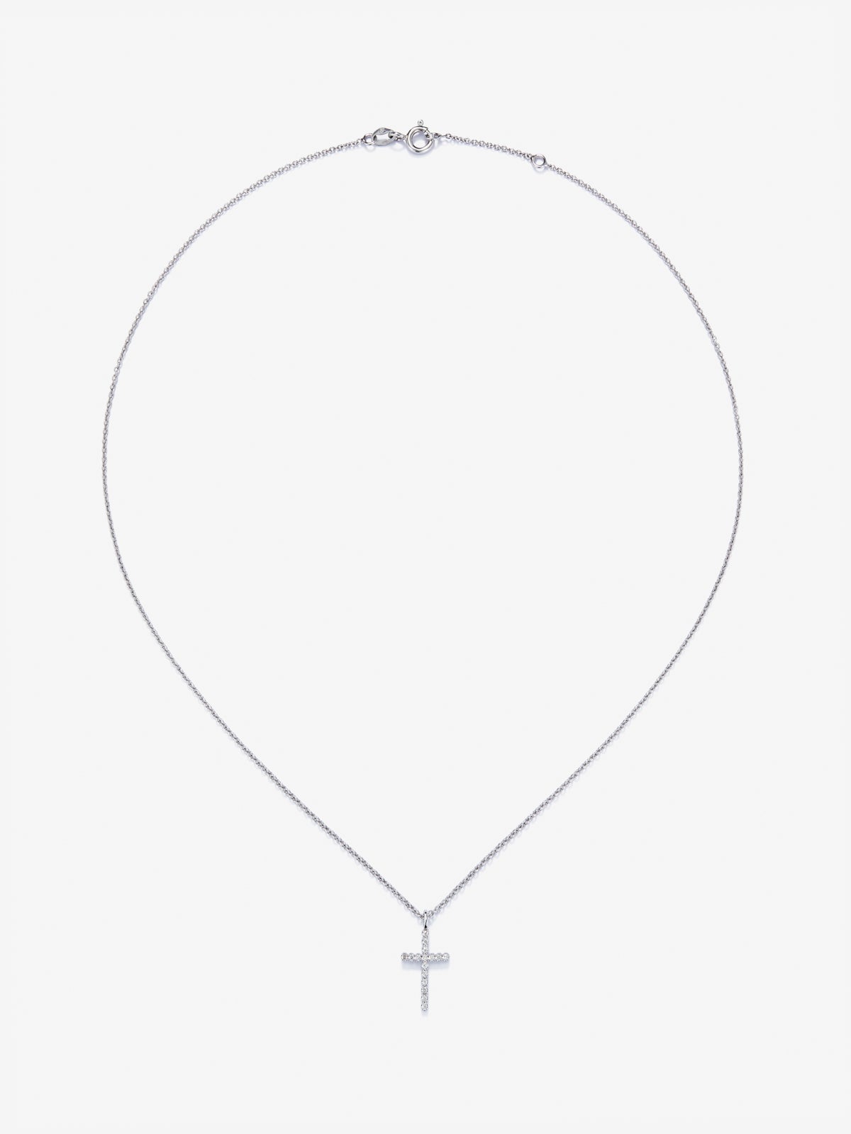 Colgante cadena cruz de oro blanco de 18K con diamantes