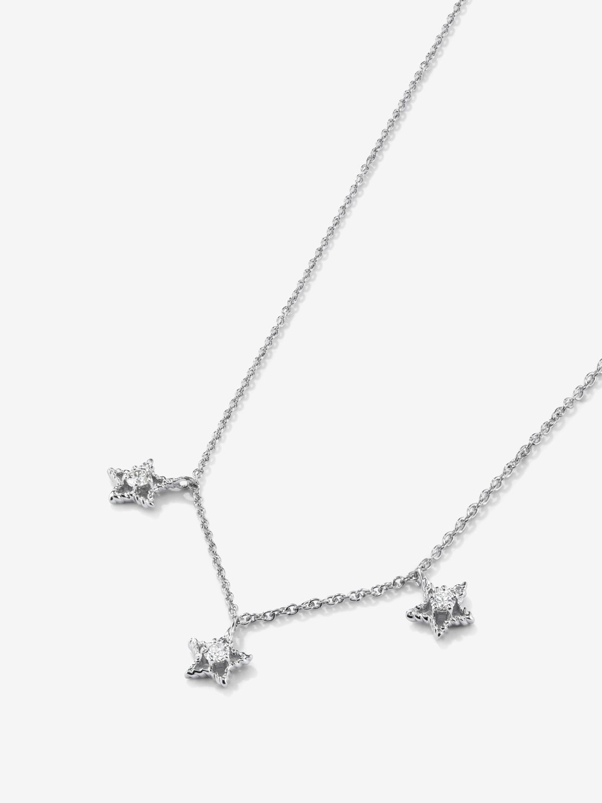 Colgante de oro blanco de 18K con 3 diamantes en talla brillante con un total de 0,2 cts