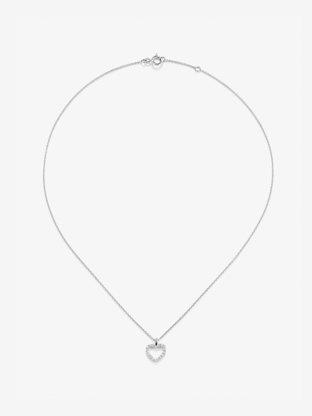 Colgante corazón de oro blanco de 18kt con diamantes de 0,22cts