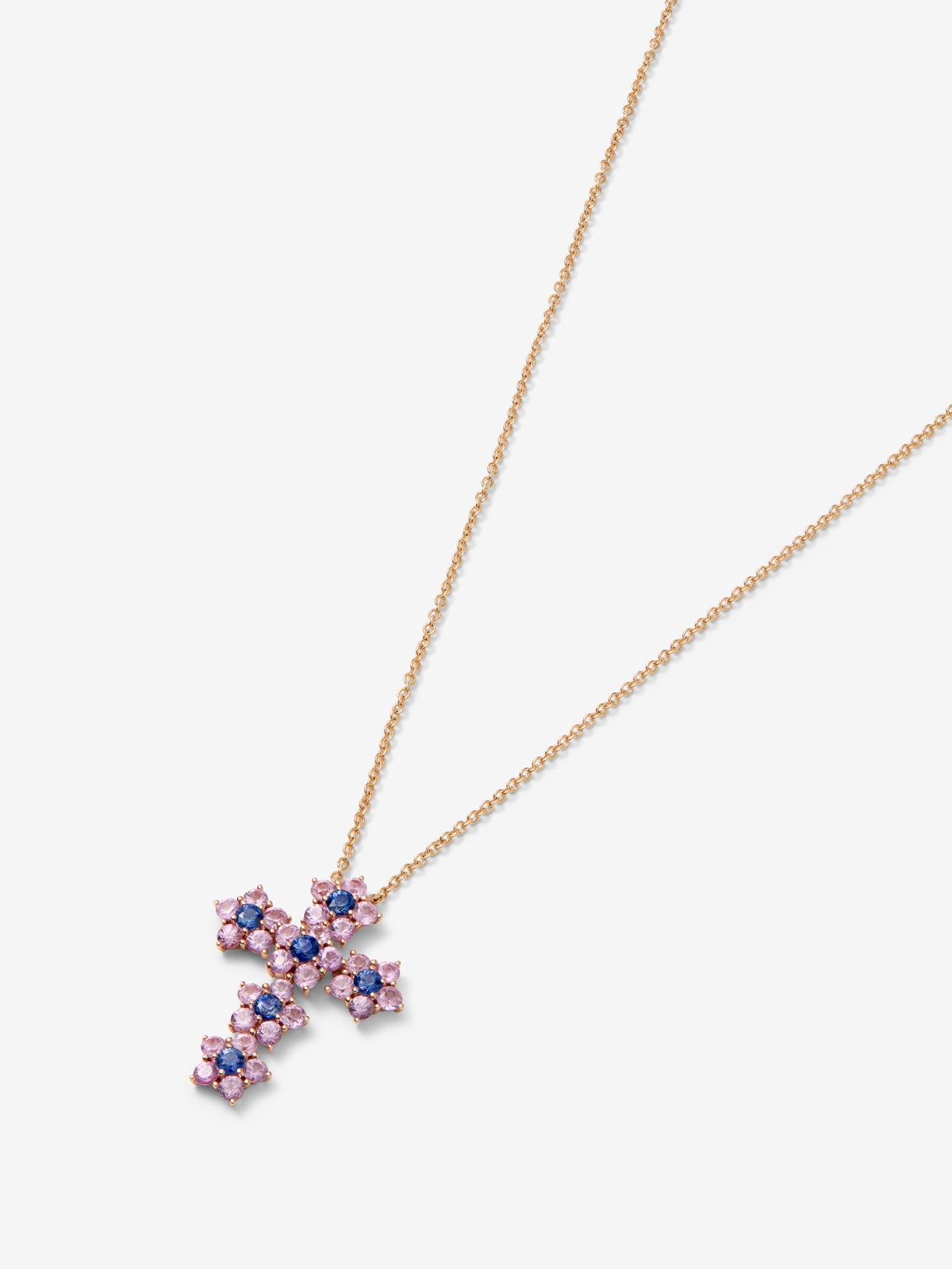 Colgante cruz de oro rosa de 18K con 30 zafiros rosas en talla brillante con un total de 1,88 cts y 6 zafiros azules en talla brillante con un total de 0,57 cts