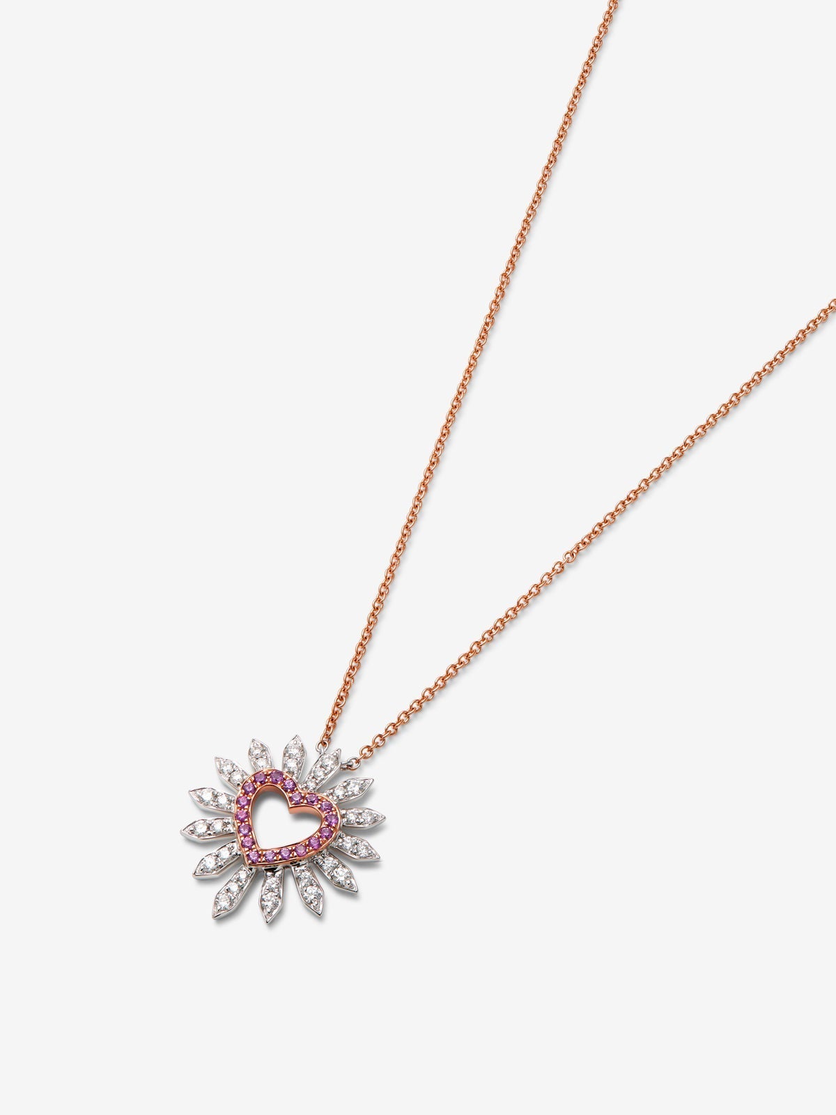 Colgante de corazón de oro blanco y rosa de 18K con diamantes blancos en talla brillante de 0,37 cts y zafiros rosas en talla brillante de 0,2 cts