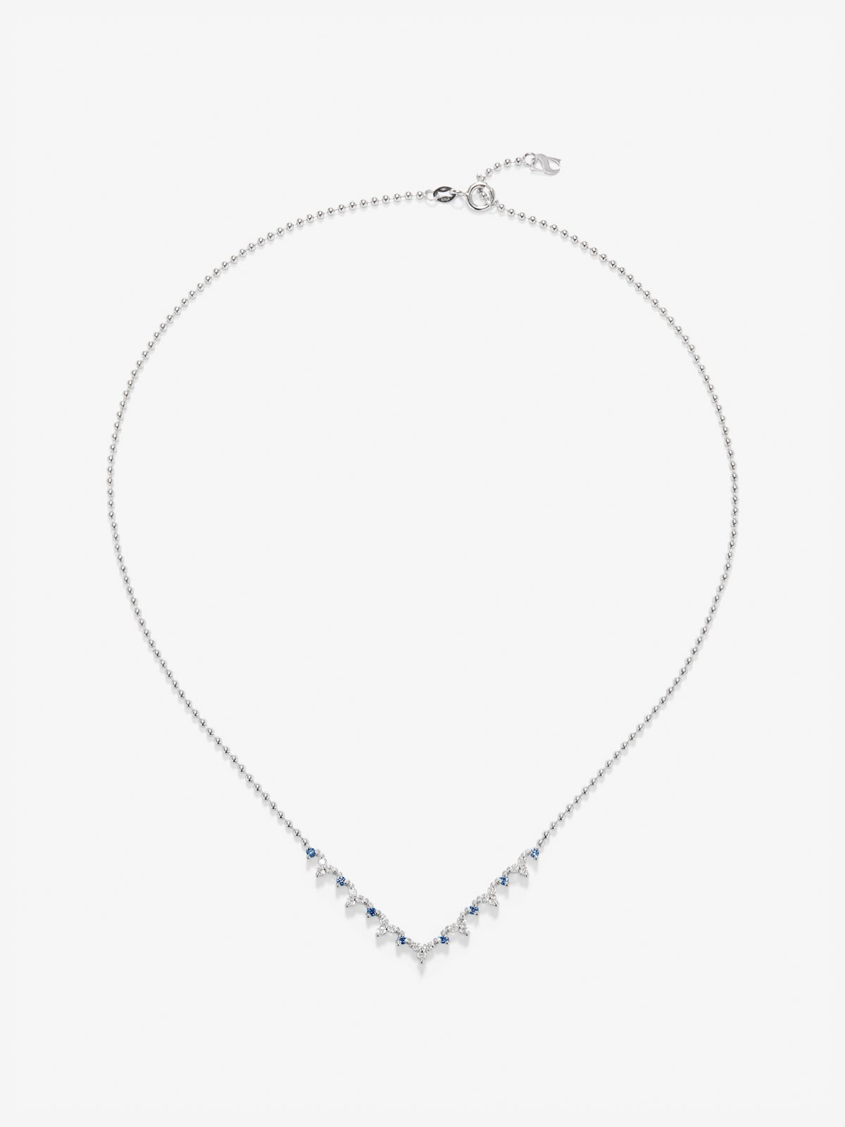 Colgante de oro blanco de 18K con 8 zafiros azules en talla brillante con un total de 1,35 cts y 21 diamantes en talla brillante con un total de 1,25 cts