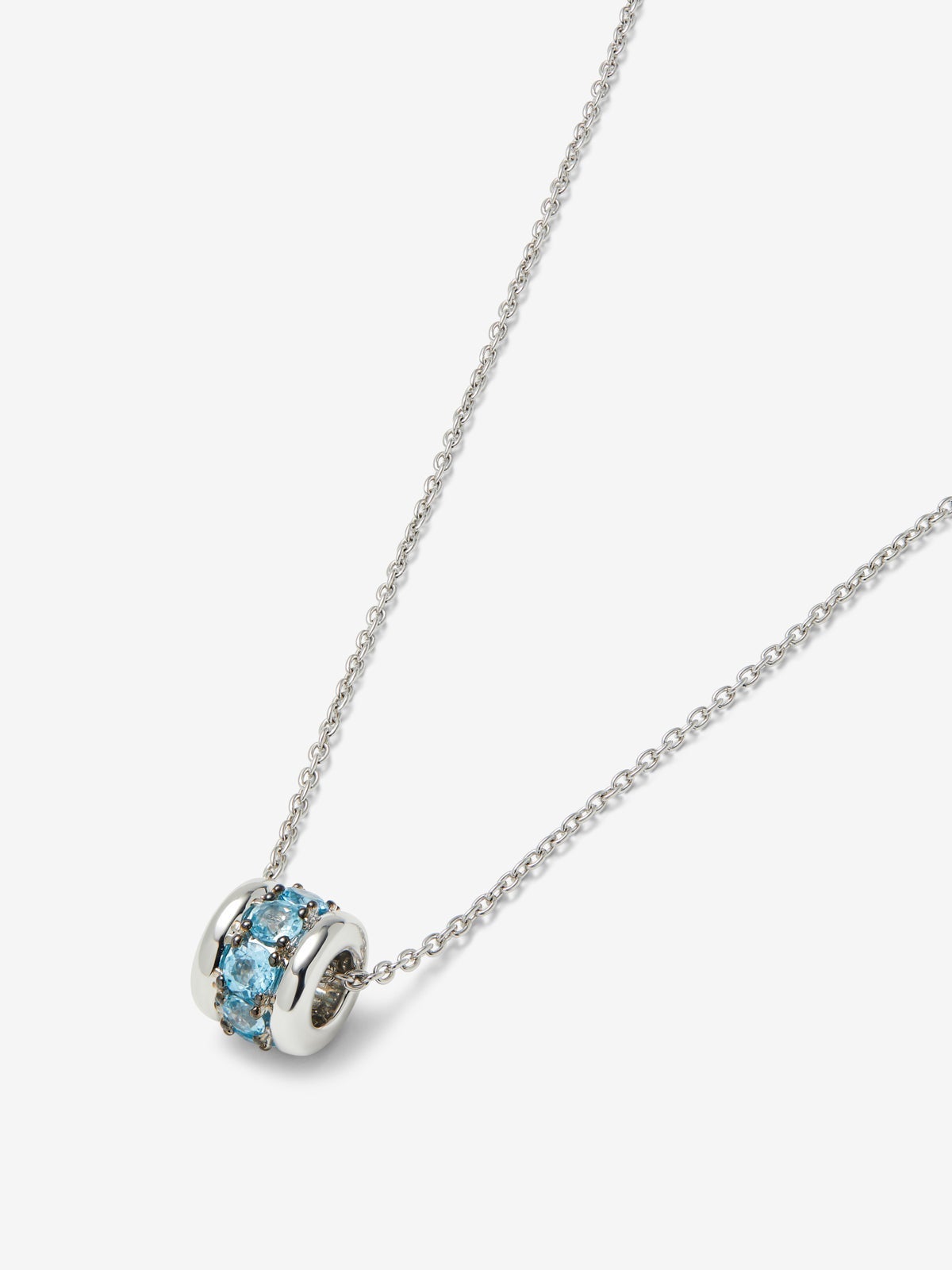 Colgante de plata 925 con pavé de topacios azul swiss en talla brillante