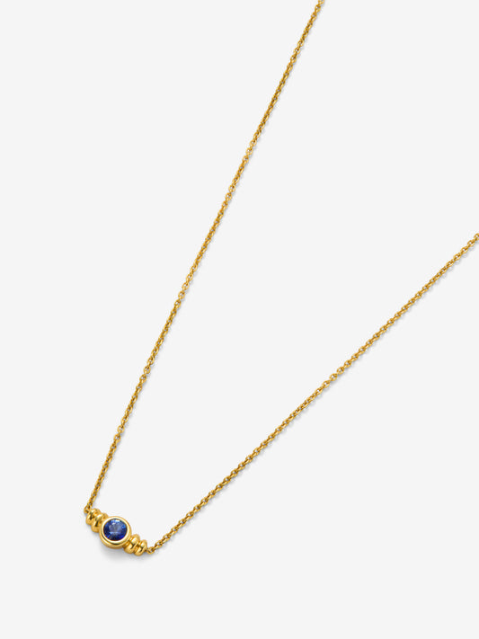 Colgante de oro amarillo de 18K con zafiro en talla brillante de 0,1cts 