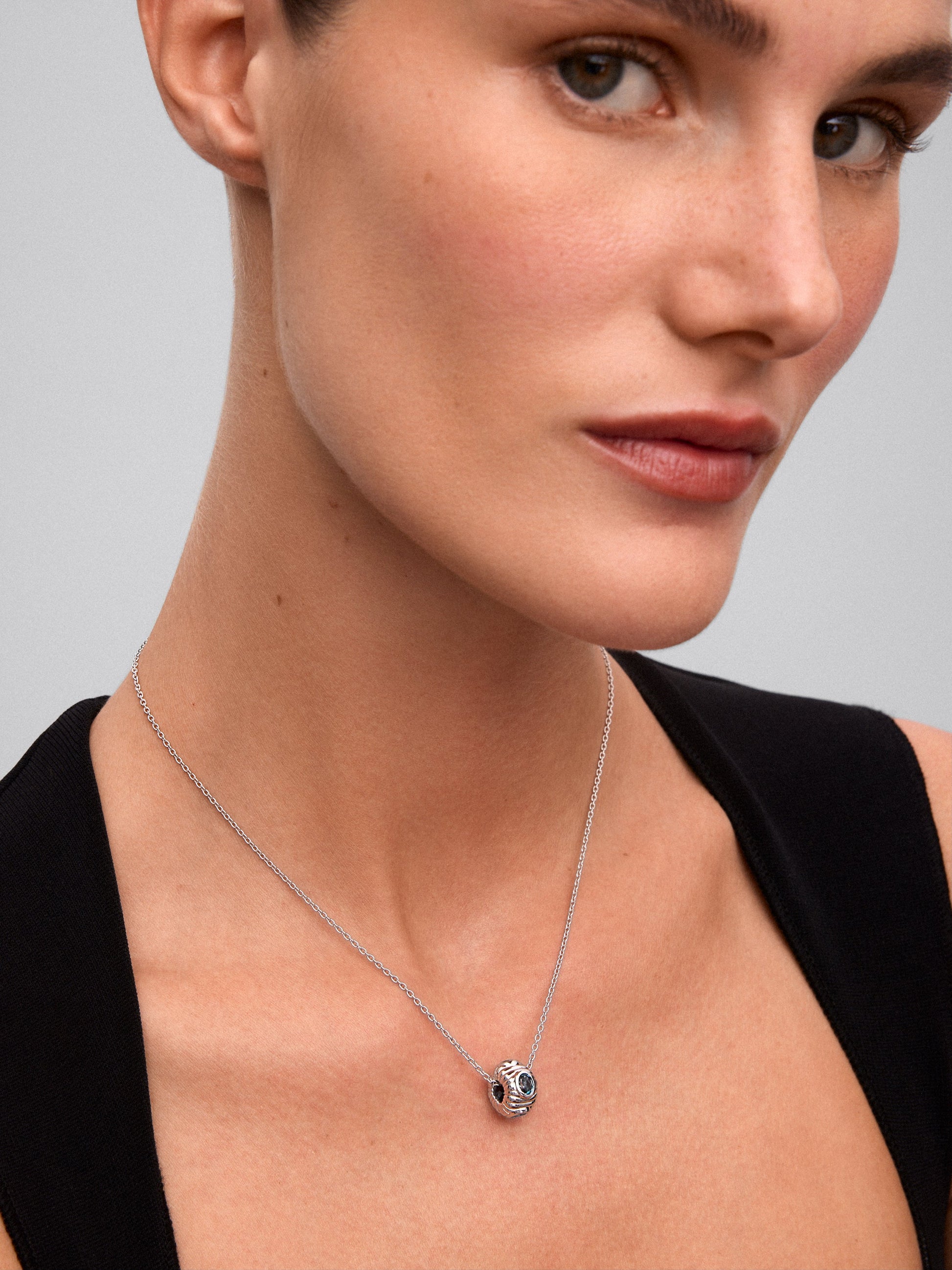 Colgante de plata 925 con topacio azul London y azul swiss