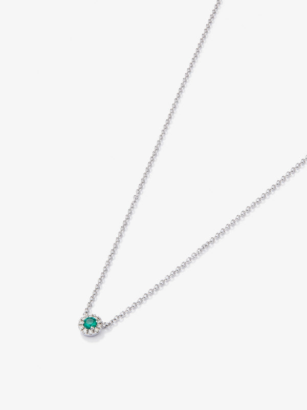Colgante de oro blanco de 18K con esmeralda en talla brillante de 0,255 cts y diamantes en talla brillante de 0,086 cts