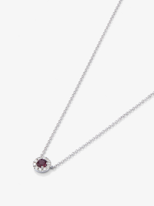 Colgante de oro blanco de 18K con rubí en talla brillante de 0,19 cts y diamantes en talla brillante de 0,05 cts