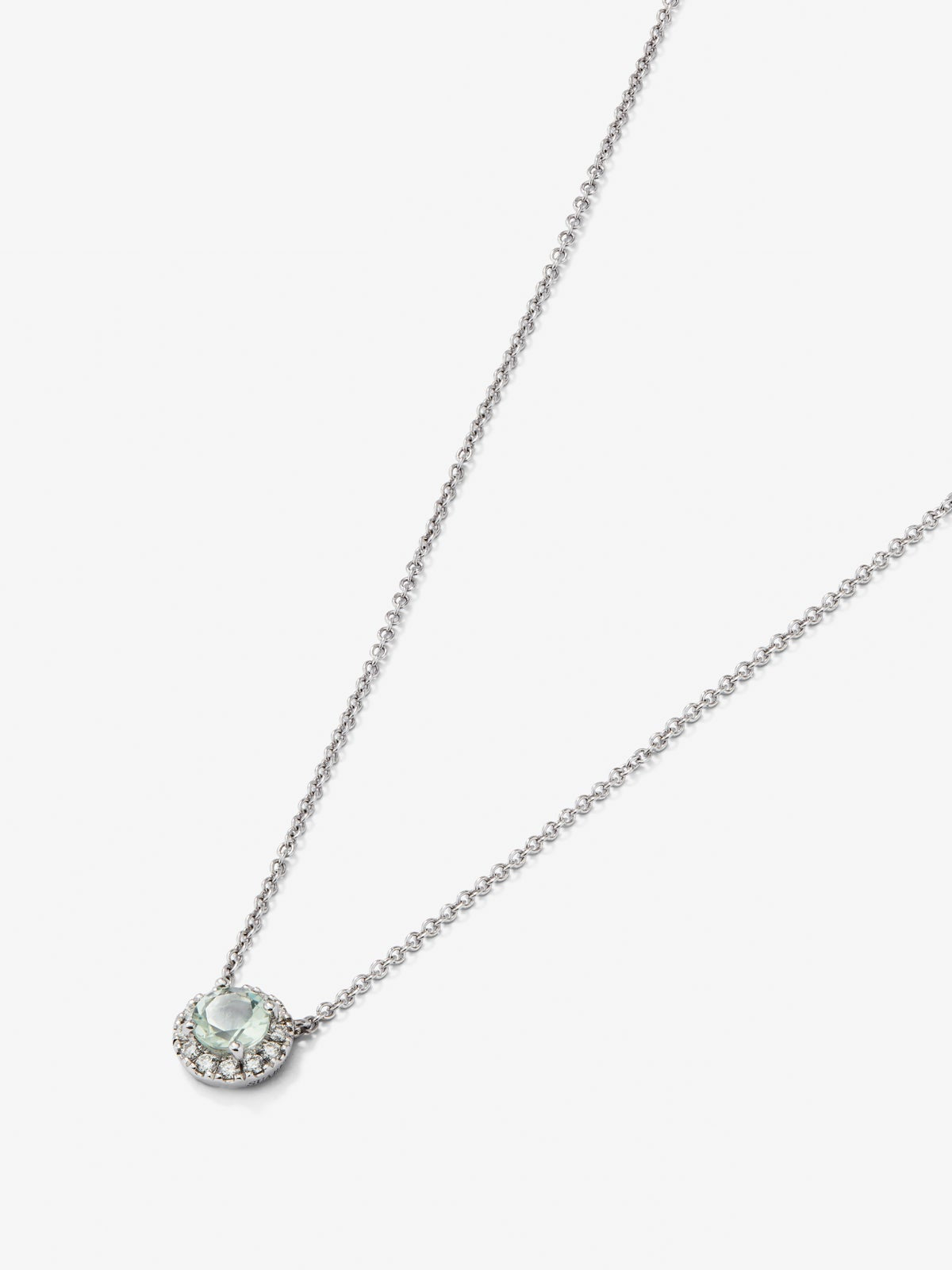 Colgante de oro blanco de 18K con una amatista verde en talla brillante de 0,44 cts y 12 diamantes en talla brillante con un total de 0,13 cts