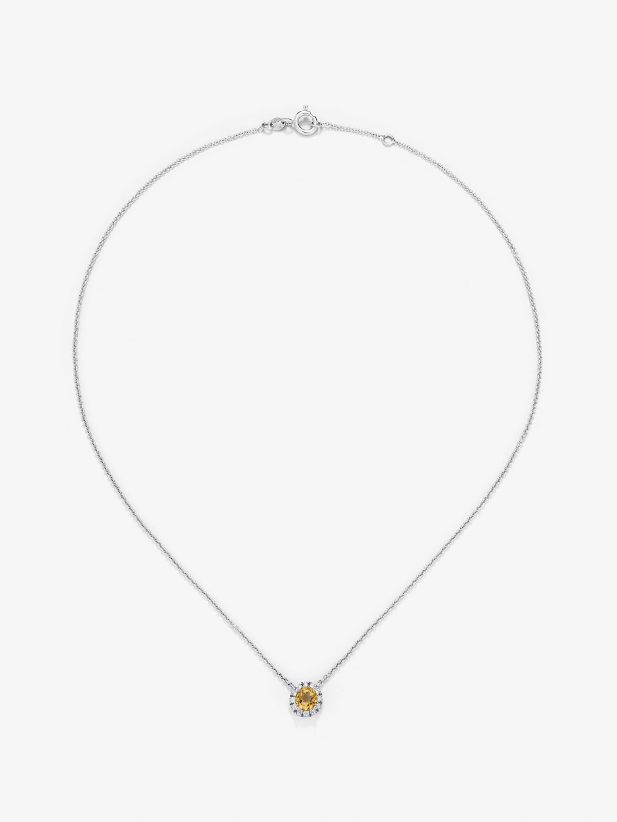 Colgante de oro blanco de 18K con cuarzo citrino 0,57 cts y diamantes 0,14 cts