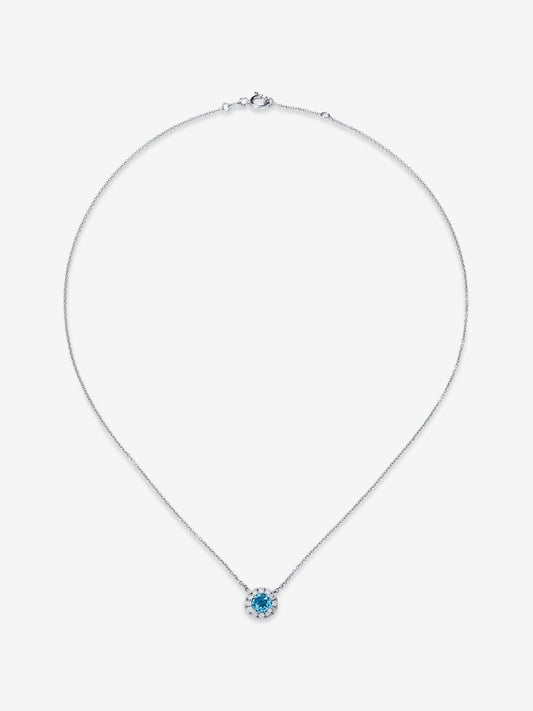 Colgante de oro blanco de 18K con topacio azul swiss 0,63 cts y diamantes 0,13 cts